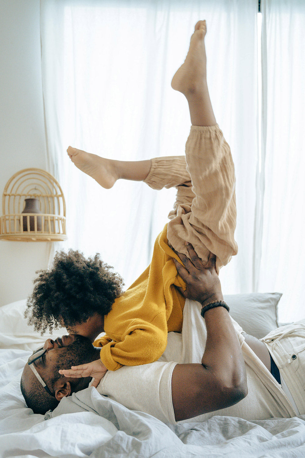 Child playing with his father
