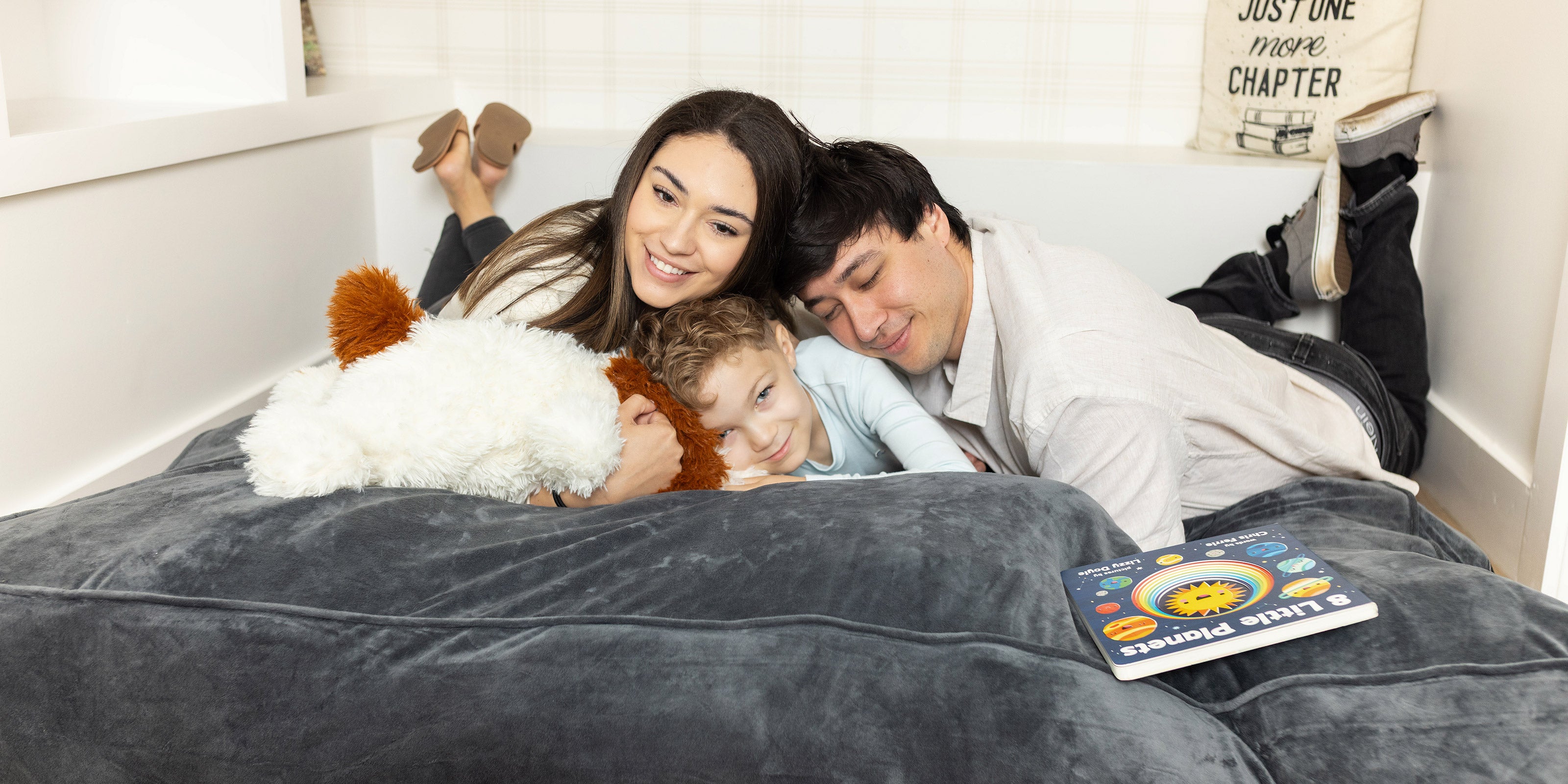 family relaxing on crash pad