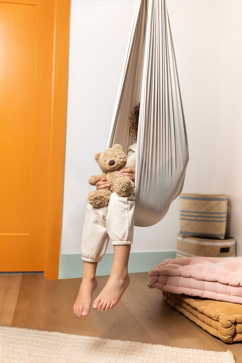 Child relaxing in swing